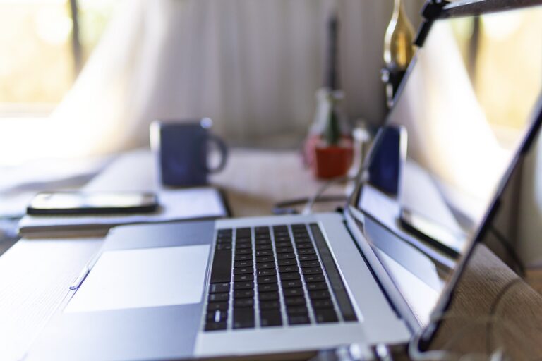 A laptop waiting for a mental health teletherapy session